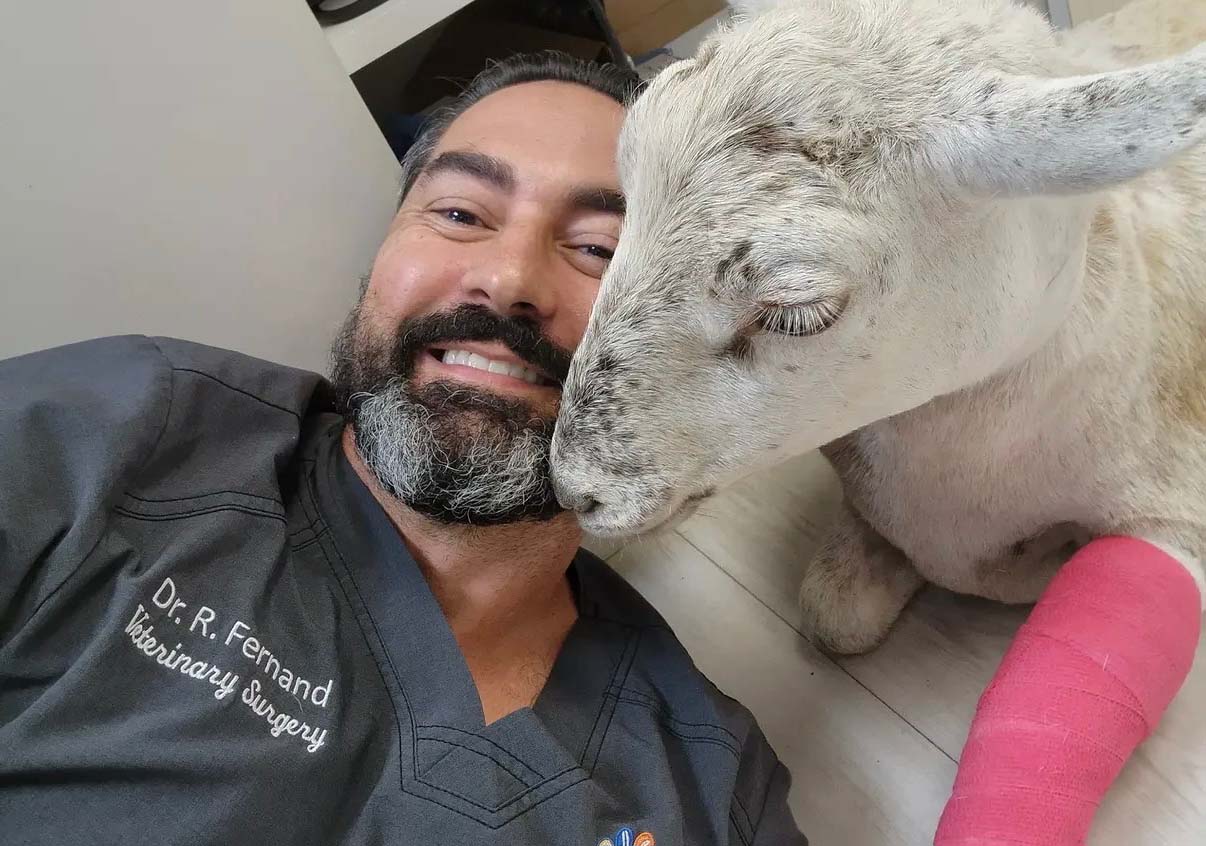 Dr. Fernand with patient